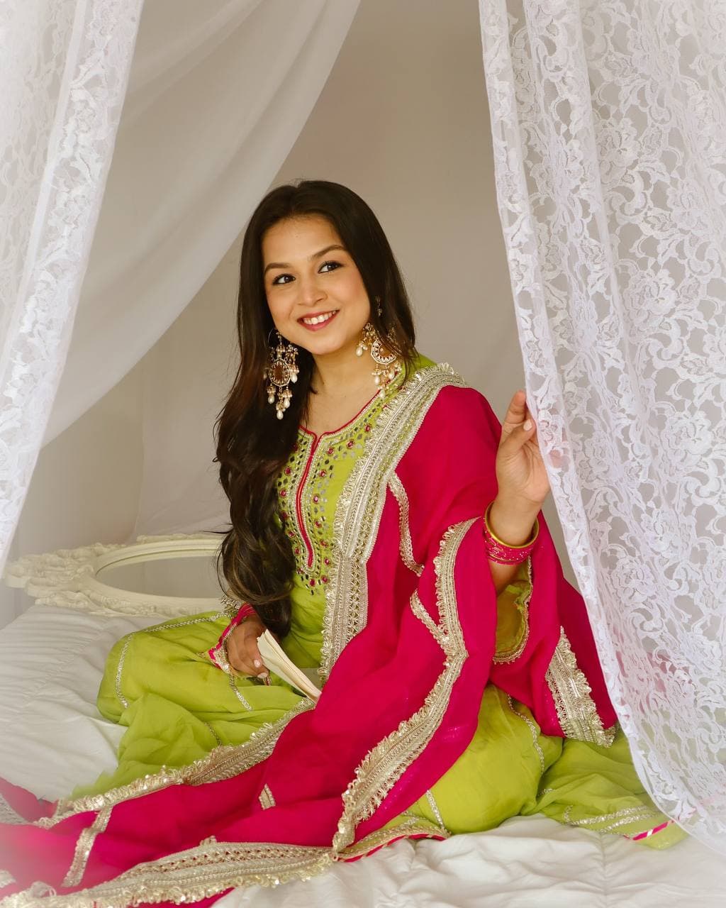Vibrant lime green traditional outfit with pink and gold accents. thumbnail 2