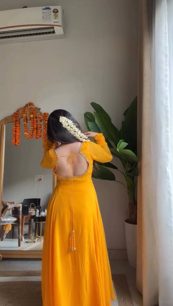 Radiant Elegance: A Yellow Dress Enchantment Unveiled thumbnail 2