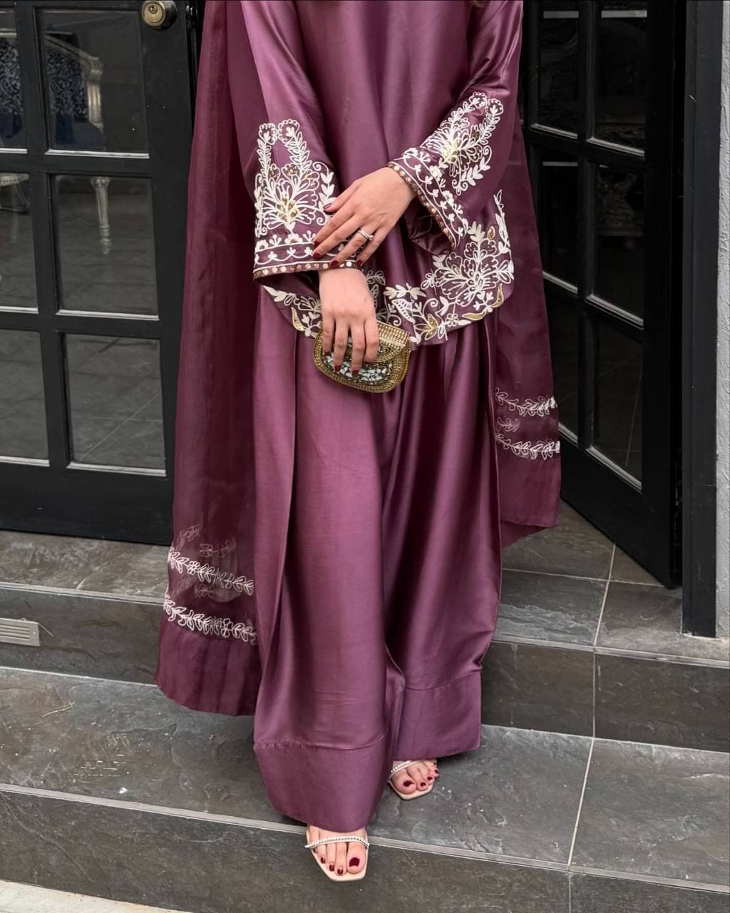 Majestic Aura: Woman in Wine Captivates at the Doorway thumbnail 3