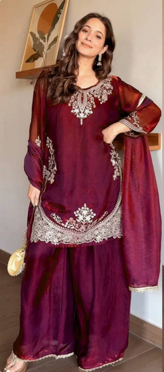 Elegance in maroon, where tradition meets modern style