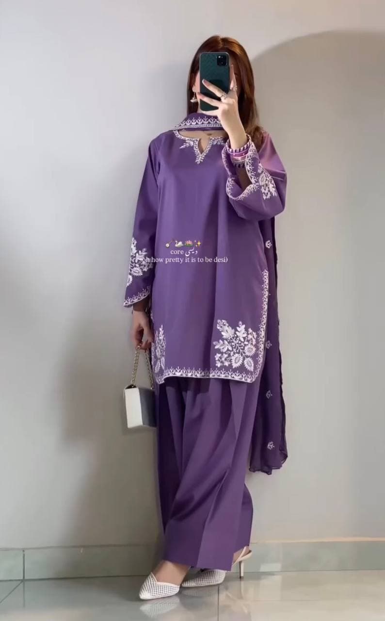 Graceful in purple, redefining elegance with modern ethnic charm
