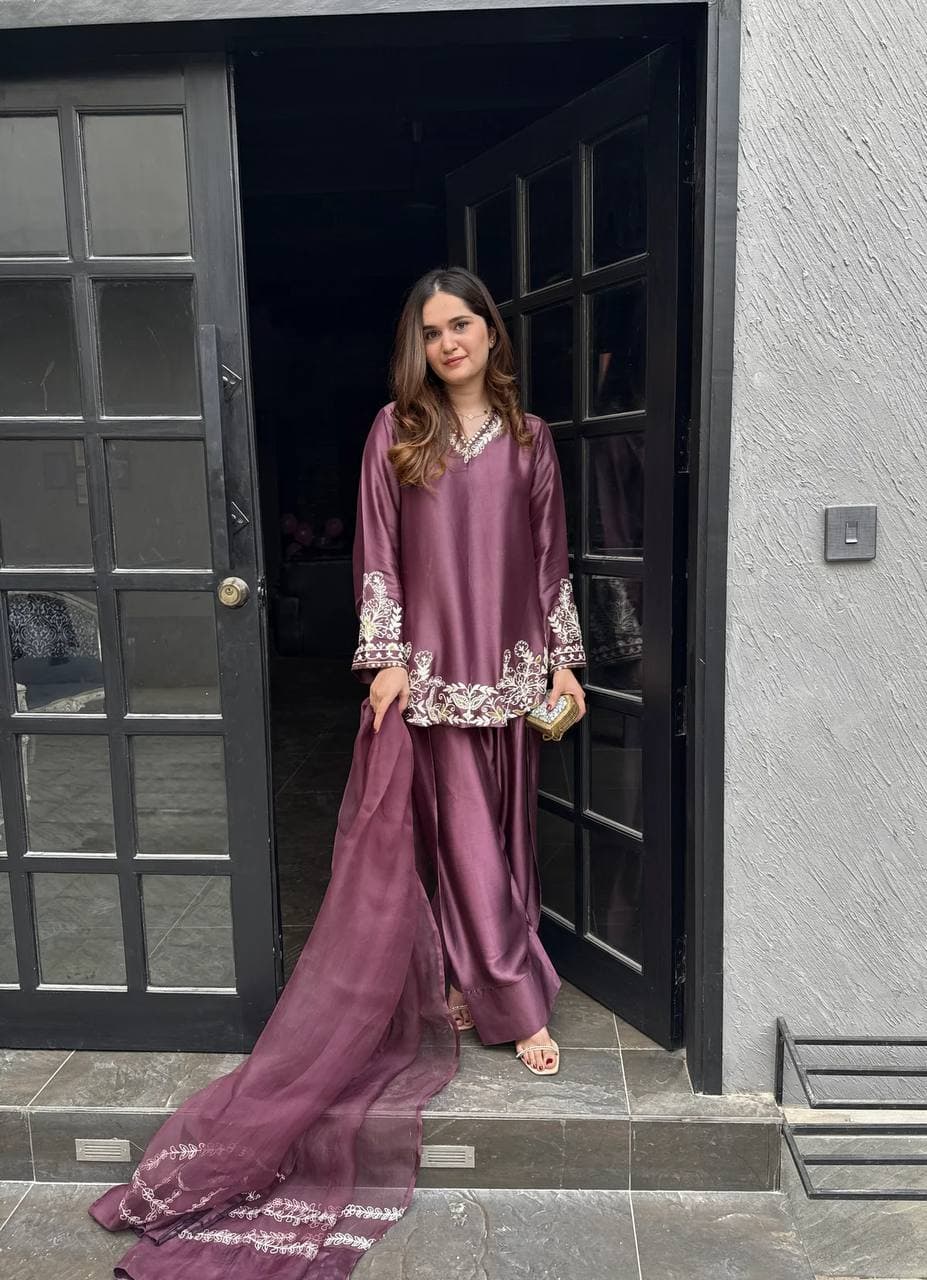 Majestic Aura: Woman in Wine Captivates at the Doorway thumbnail 2