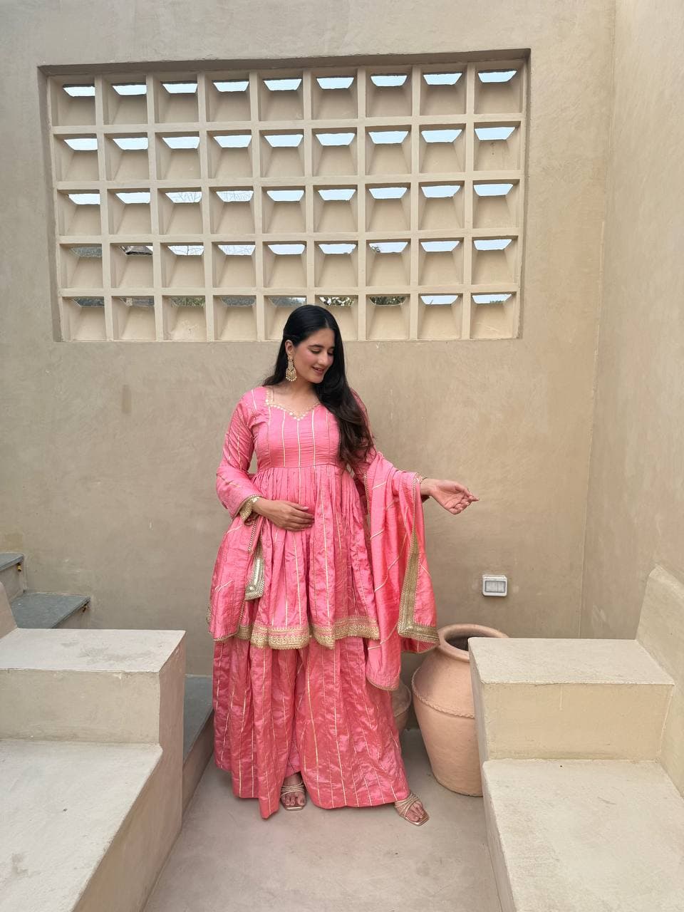 These outfits appear to be Anarkali Kurta Sets with Dupatta
