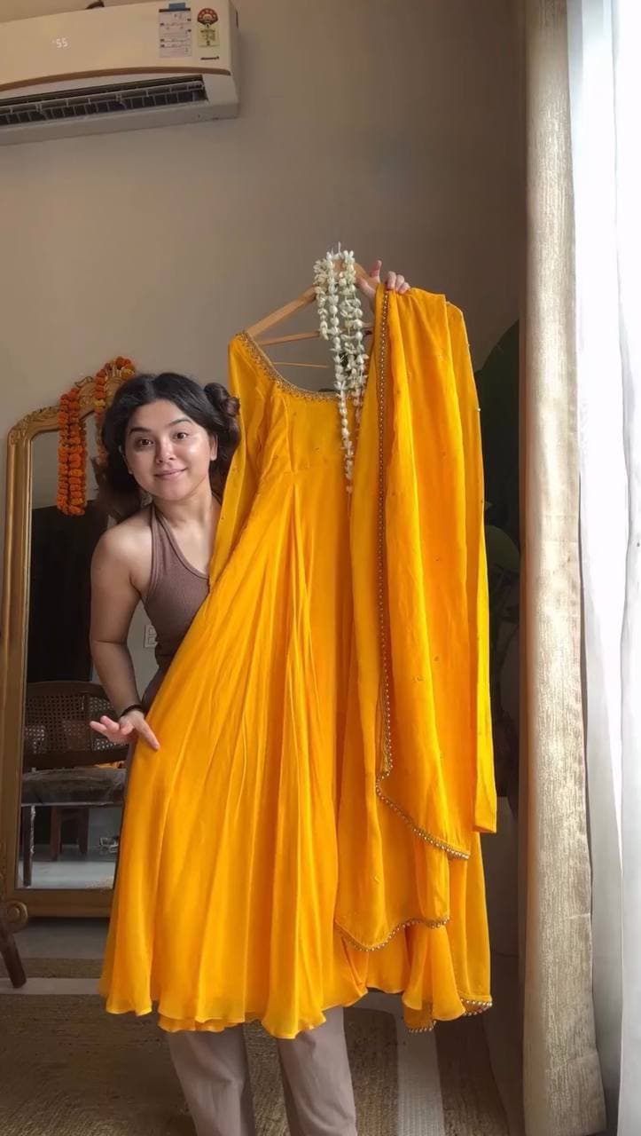 Radiant Elegance: A Yellow Dress Enchantment Unveiled thumbnail 4