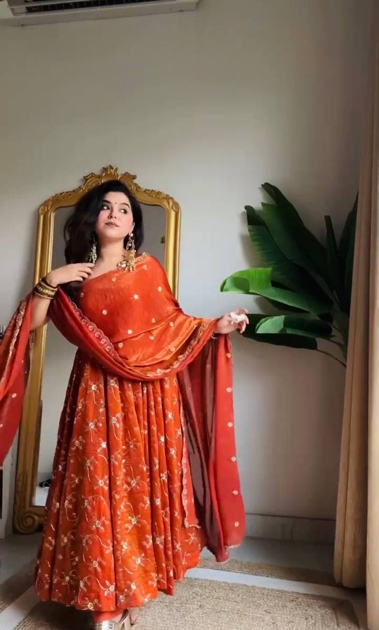 Radiant Elegance: A Vision in Orange Glamour thumbnail 2