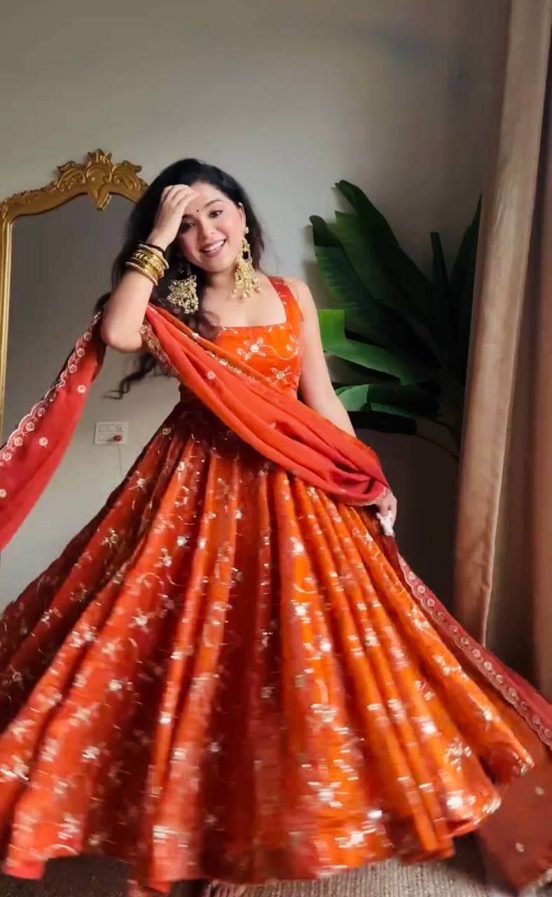 Radiant Elegance: A Vision in Orange Glamour thumbnail 4